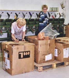 A coloured photograph of two women packing orders at E&S Smiths. Photograph: Richard Smith